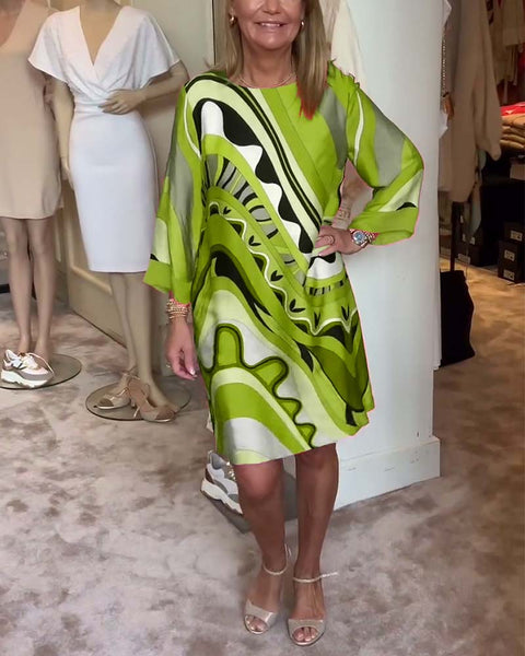 Sophia™ - Chic Floral Midi Dress with Round Neck