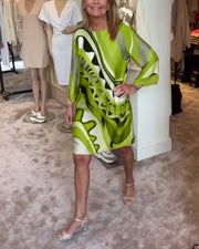 Sophia™ - Chic Floral Midi Dress with Round Neck