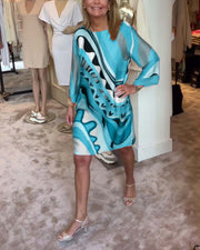 Sophia™ - Chic Floral Midi Dress with Round Neck